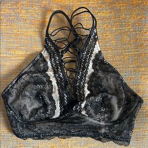 Black Lace Bralette with Strappy Design and Cream Trim